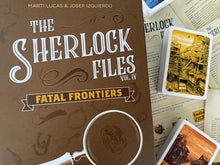 Load image into Gallery viewer, The Sherlock Files Fatal Frontiers front cover and cards in background
